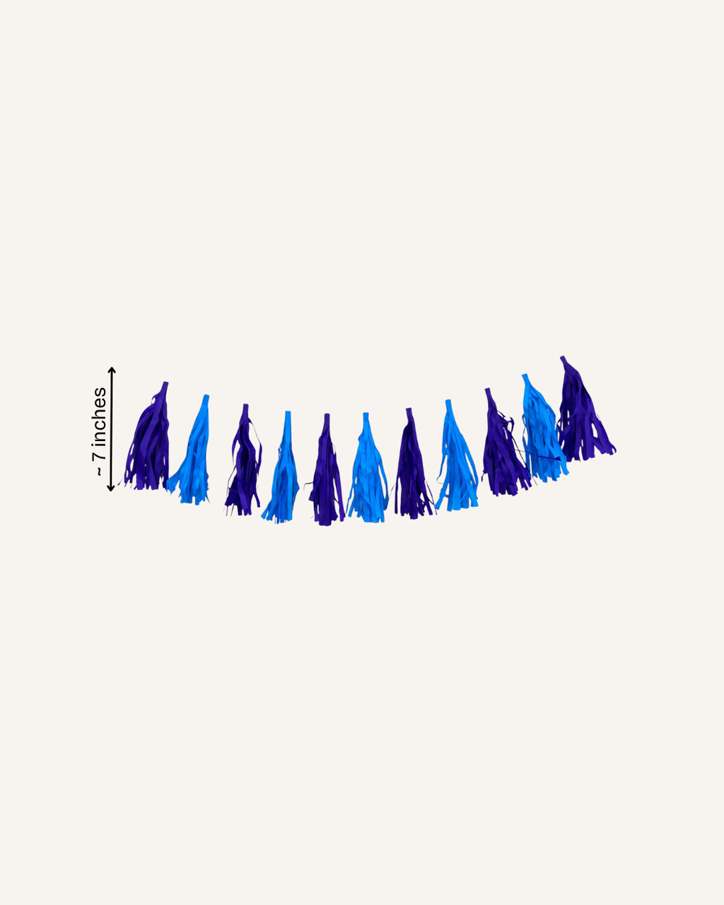 Paper Party Studio tissue paper tassel garland for party decorations and photo backdrops.