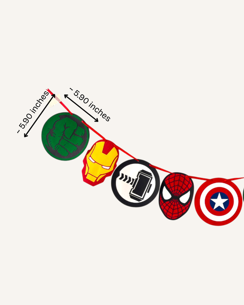 Paper Party Studio superhero emblem garland with comic icon discs in red, blue, green and gold.
