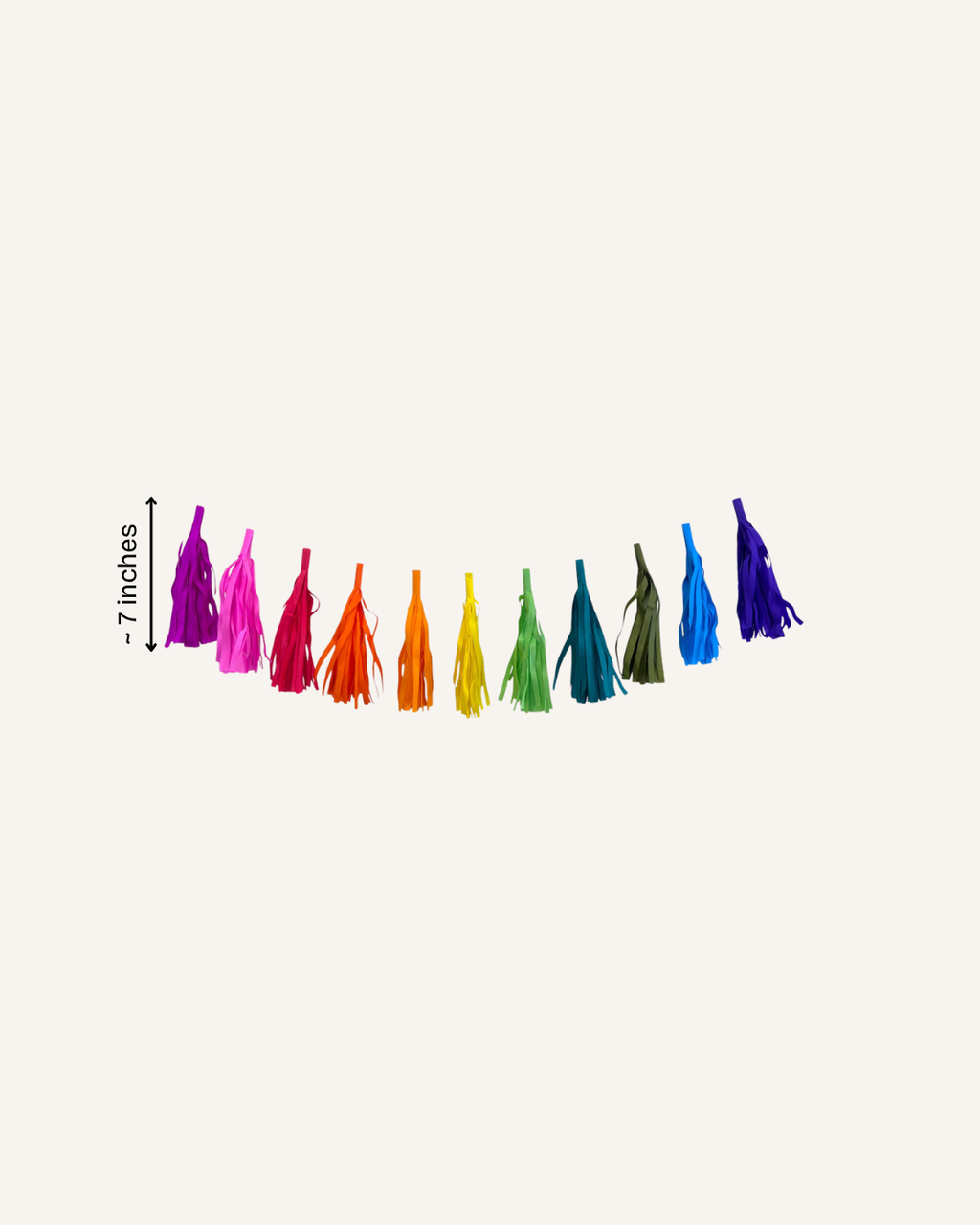 Paper Party Studio tissue paper tassel garland, handmade and strung on a cord for party backdrops.