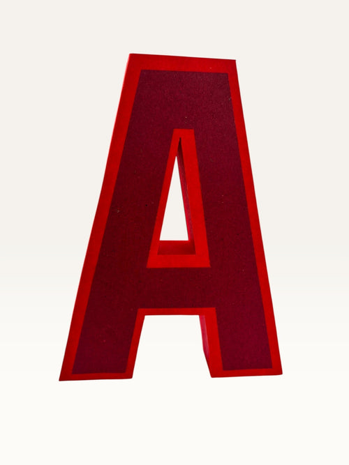 Paper Party Studio handcrafted red 3D letter A made from layered cardstock for birthday and event decor.