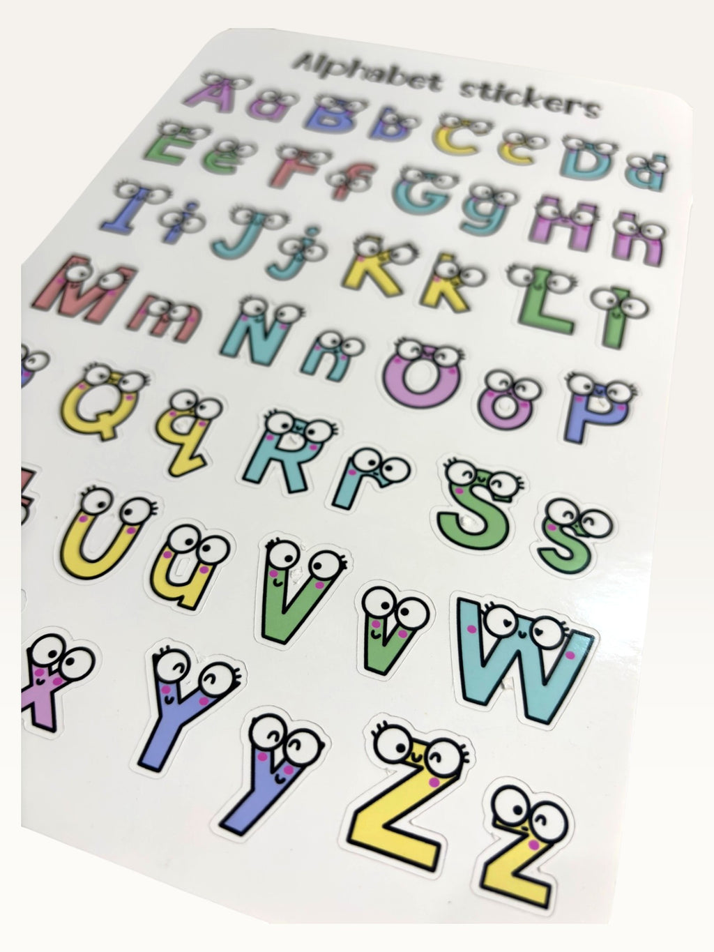 Paper Party Studio alphabet sticker sheet with colourful uppercase and lowercase letters featuring googly eyes