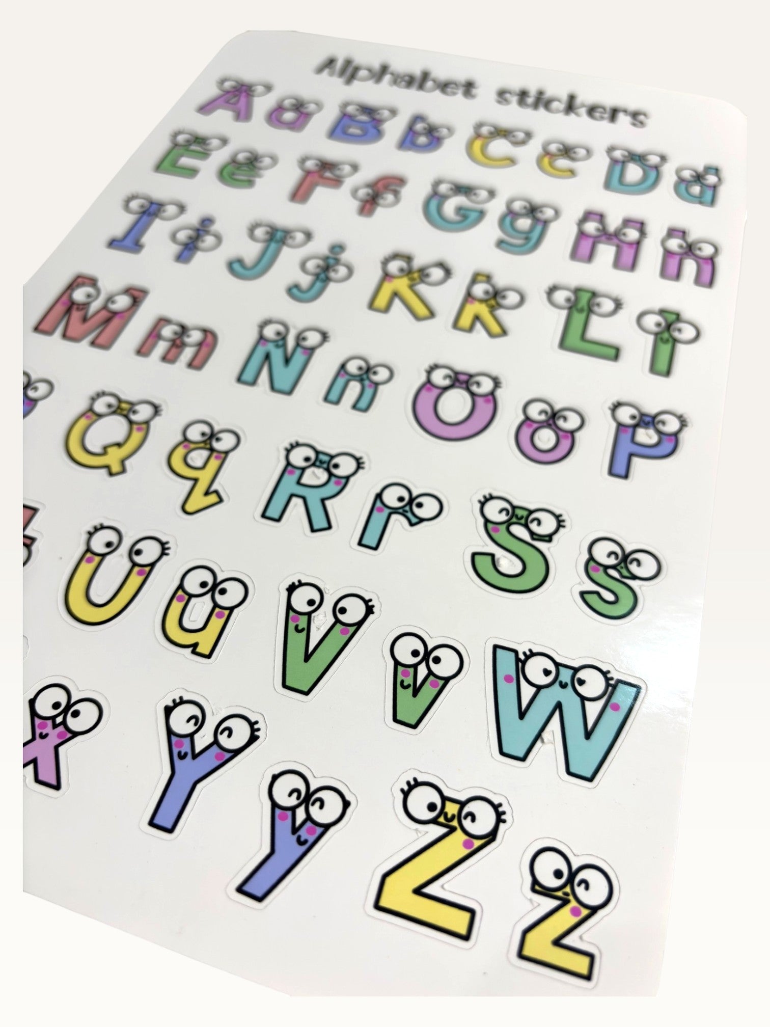 Paper Party Studio alphabet sticker sheet with colourful uppercase and lowercase letters featuring googly eyes
