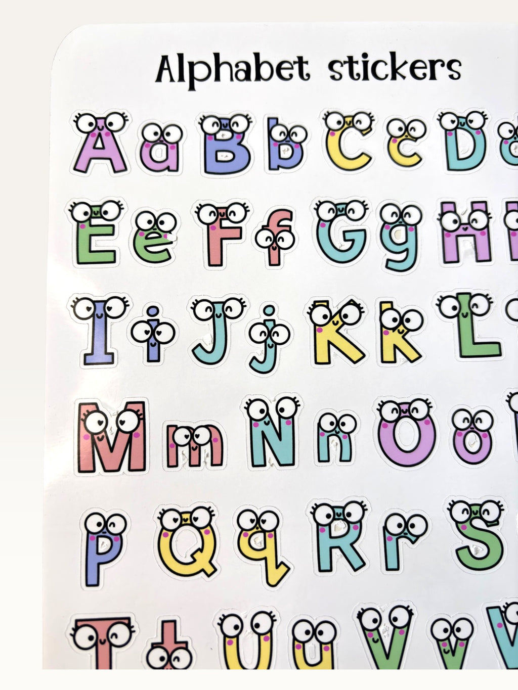 Paper Party Studio alphabet sticker sheet with colourful uppercase and lowercase letters featuring cute googly eyes.