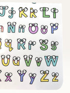 Paper Party Studio alphabet sticker sheet featuring colourful letters with cute googly eyes and glossy finish.