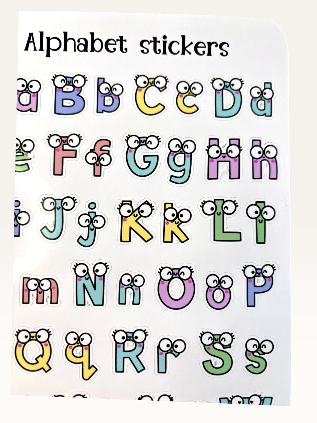 Paper Party Studio alphabet sticker sheet with colourful uppercase and lowercase letters featuring cute googly eyes.