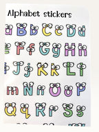 Paper Party Studio alphabet sticker sheet with colourful uppercase and lowercase letters featuring cute googly eyes.
