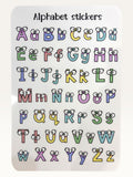 Paper Party Studio alphabet sticker sheet with colourful uppercase and lowercase letters featuring googly eyes