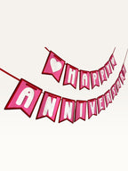 Paper Party Studio pink and white swallowtail heart bunting banner for romantic anniversary celebrations.