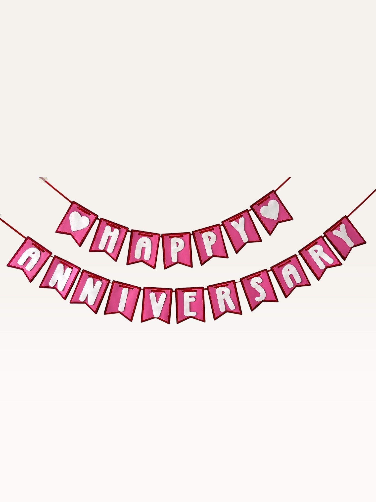 Paper Party Studio pink and white Happy Anniversary swallowtail paper bunting banner with heart accents.