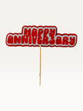 Paper Party Studio Happy Anniversary cake topper with red bubble letters, white scalloped backing, and heart cut-outs.