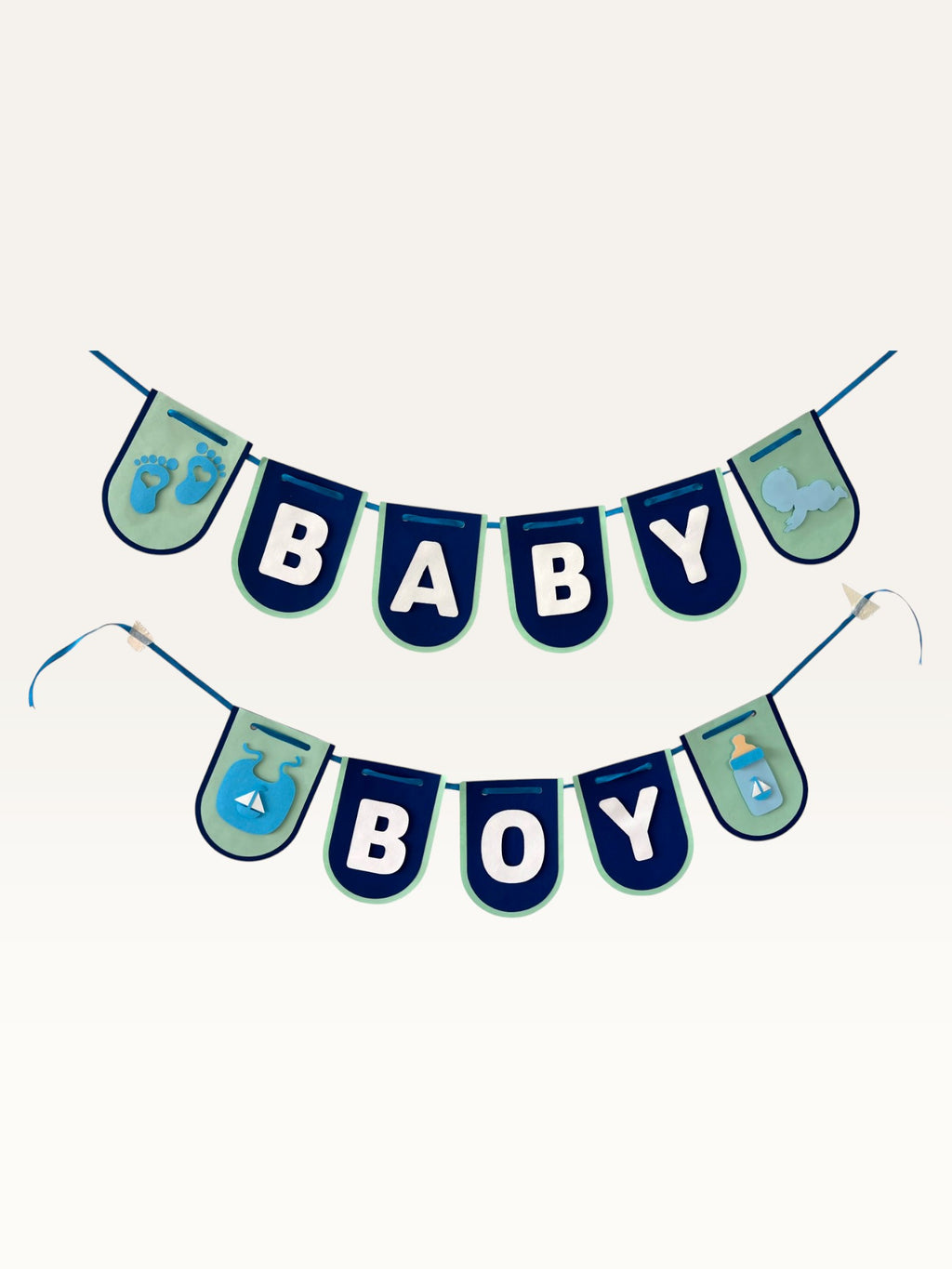 Paper Party Studio navy and sage Baby Boy cardstock bunting with white letters and baby-themed cut-out decorations.
