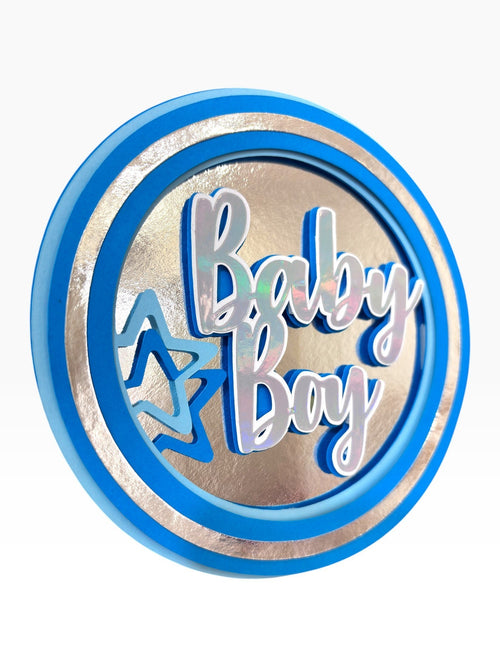 Paper Party Studio blue and silver holographic "Baby Boy" cake topper with layered stars.