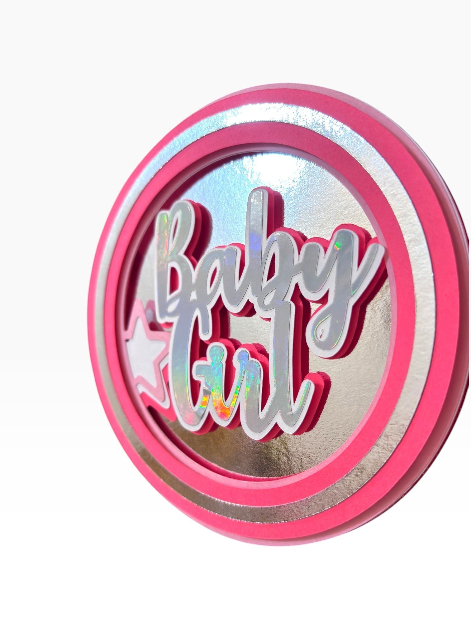 Paper Party Studio Baby Girl holographic layered cardstock cake topper with pink and silver accents and star detail.