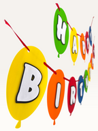 Paper Party Studio multicoloured balloon-shaped Happy Birthday banner with dimensional white letters on red string.