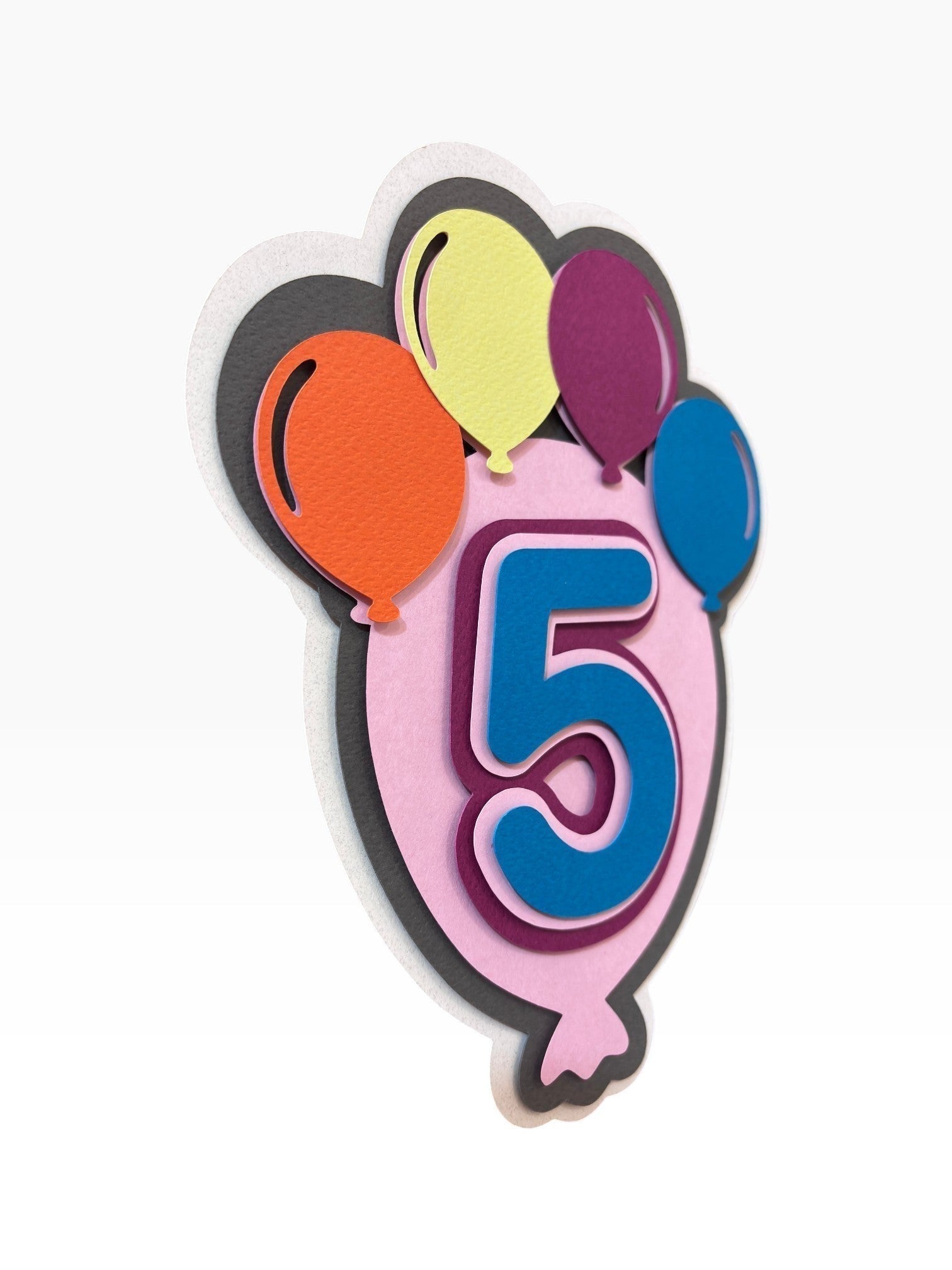 Paper Party Studio layered cardstock balloon cake topper with the number 5 in blue and purple.