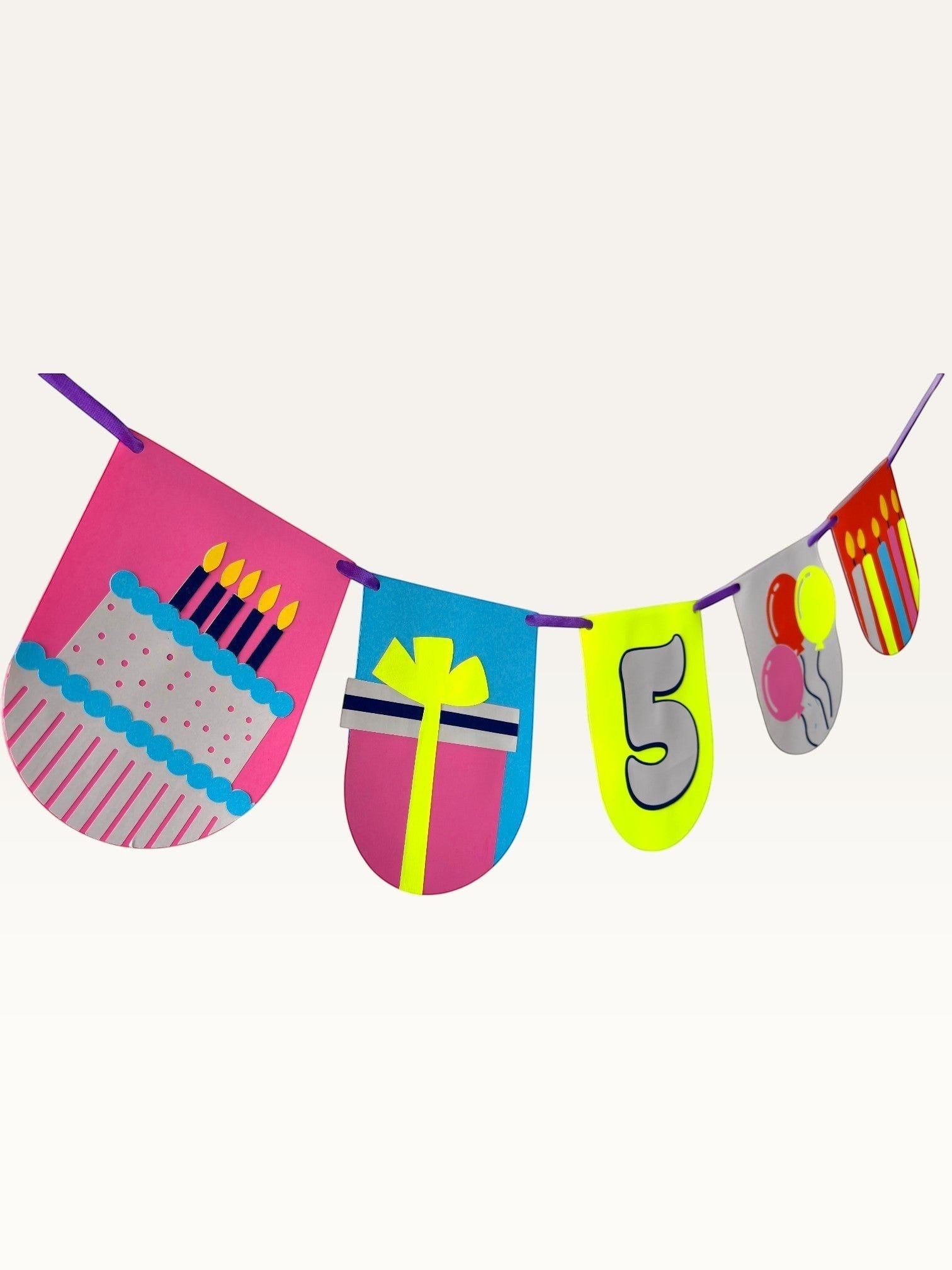 Paper Party Studio custom birthday bunting with colorful paper flags featuring a cake, gift, balloons, and age number.