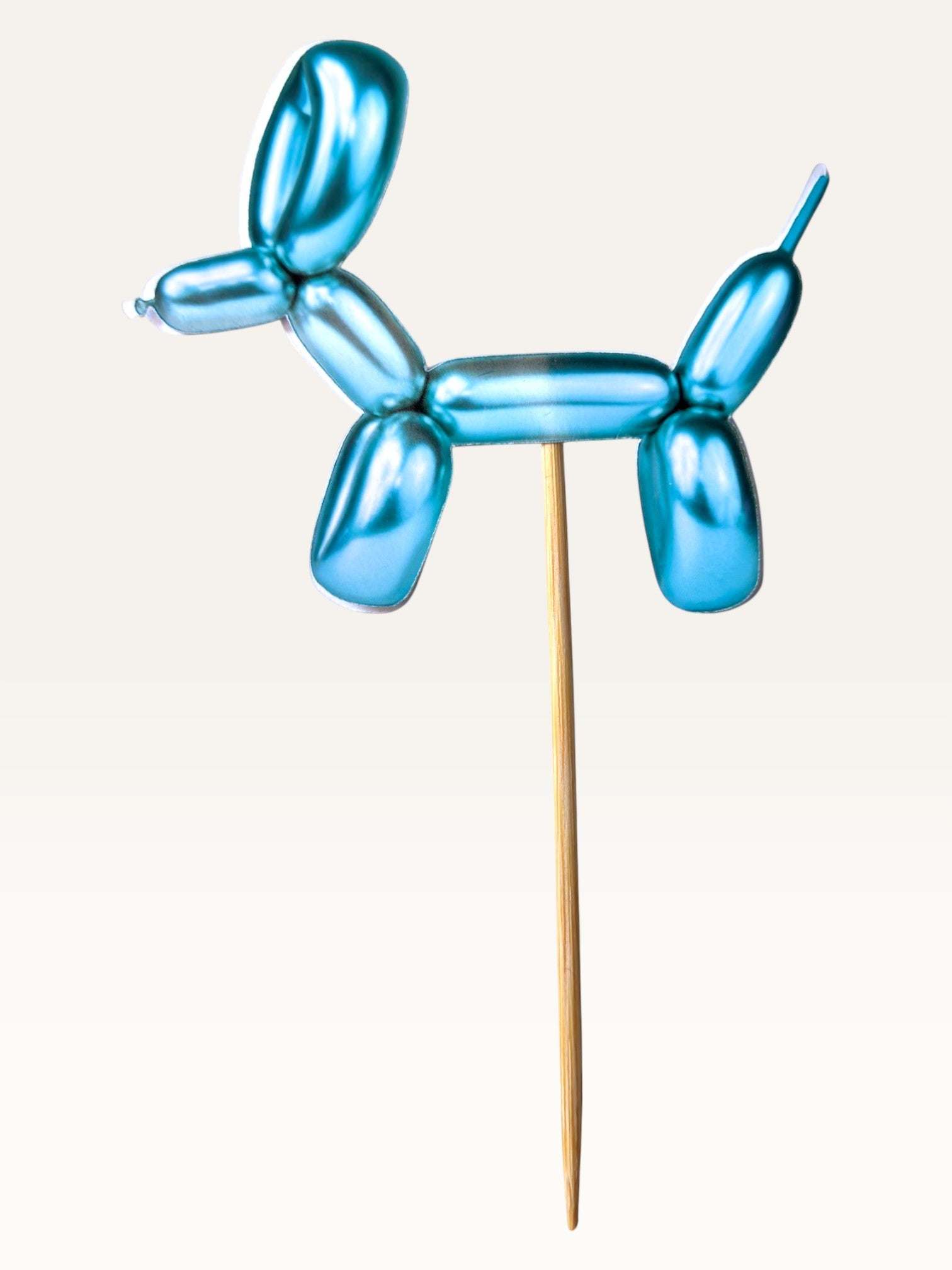 Paper Party Studio blue metallic balloon dog cupcake topper on a bamboo stick with double-sided foil print.