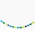 Paper Party Studio blue and green fringe garland with alternating tassels. Perfect for baby showers and parties.
