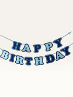 Paper Party Studio blue layered paper Happy Birthday banner with dimensional cut-out letters on a hanging cord