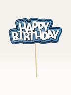 Paper Party Studio layered blue and white Happy Birthday cake topper with scalloped edges on a wooden pick.