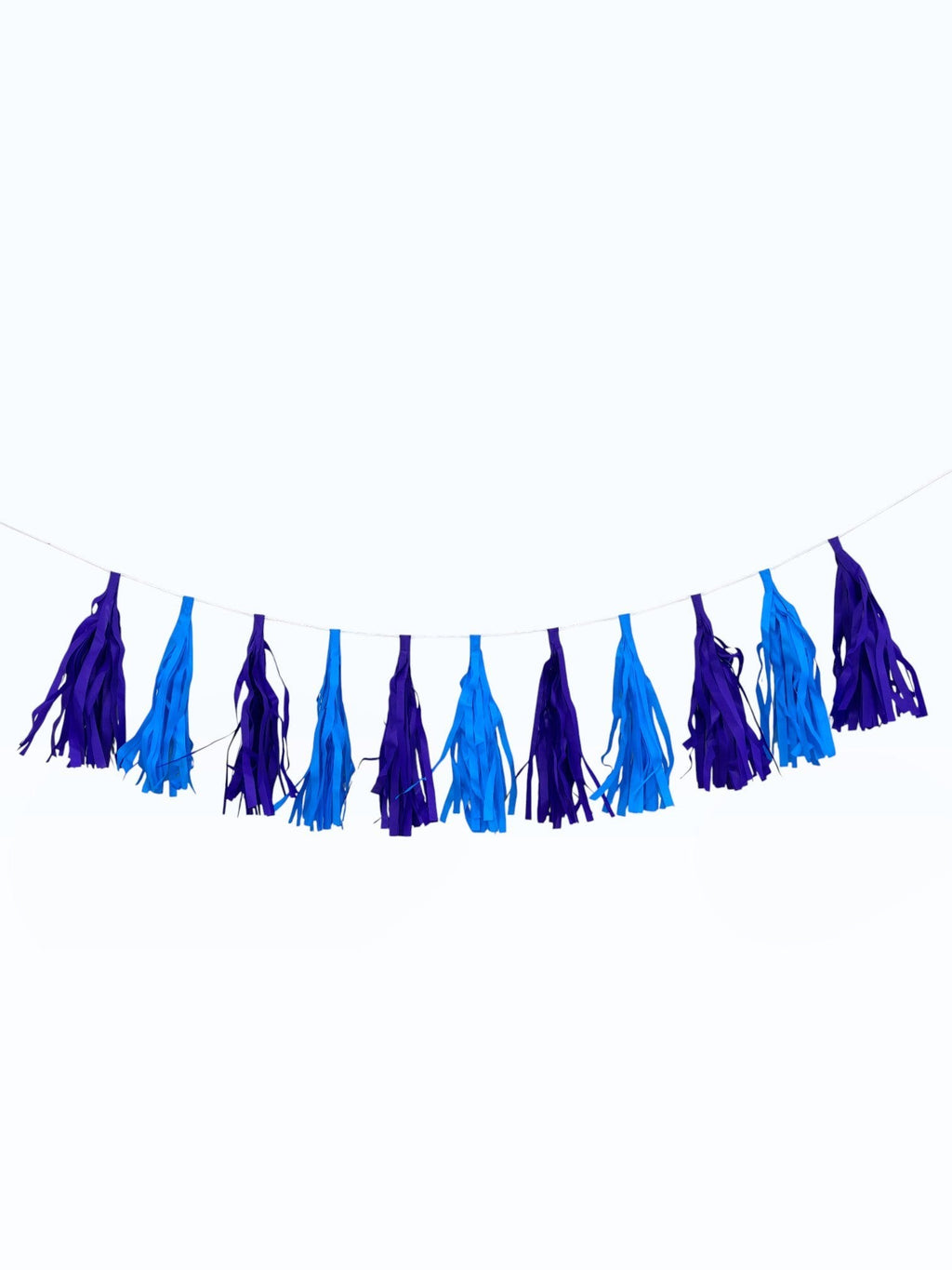 Paper Party Studio blue and purple paper tassel garland for tropical luau birthday party decorations.