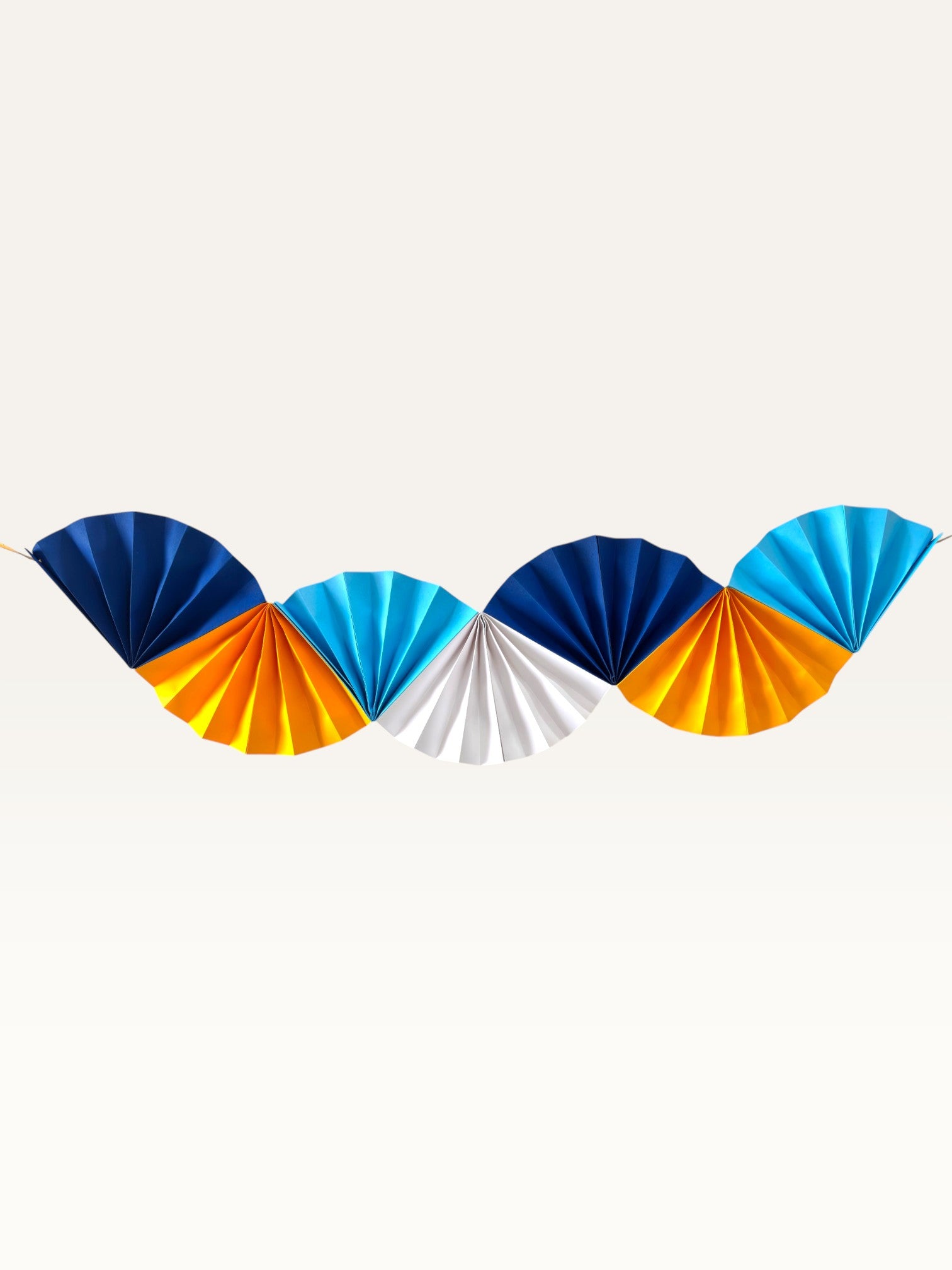 Paper Party Studio blue and yellow paper fan garland for birthday party decorations