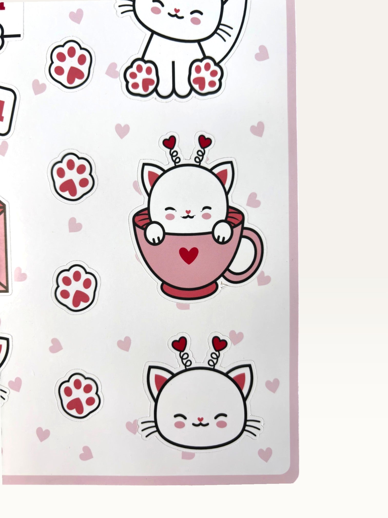 Paper Party Studio glossy sticker sheet featuring cute white cats in pink mugs and heart-themed designs