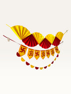 Paper Party Studio yellow and red paper Diwali decoration set featuring Om and Swastik motifs and fan garlands.