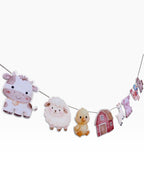 Paper Party Studio farm animal garland with watercolour cow, sheep, duckling, barn, pig, and goat on a string.