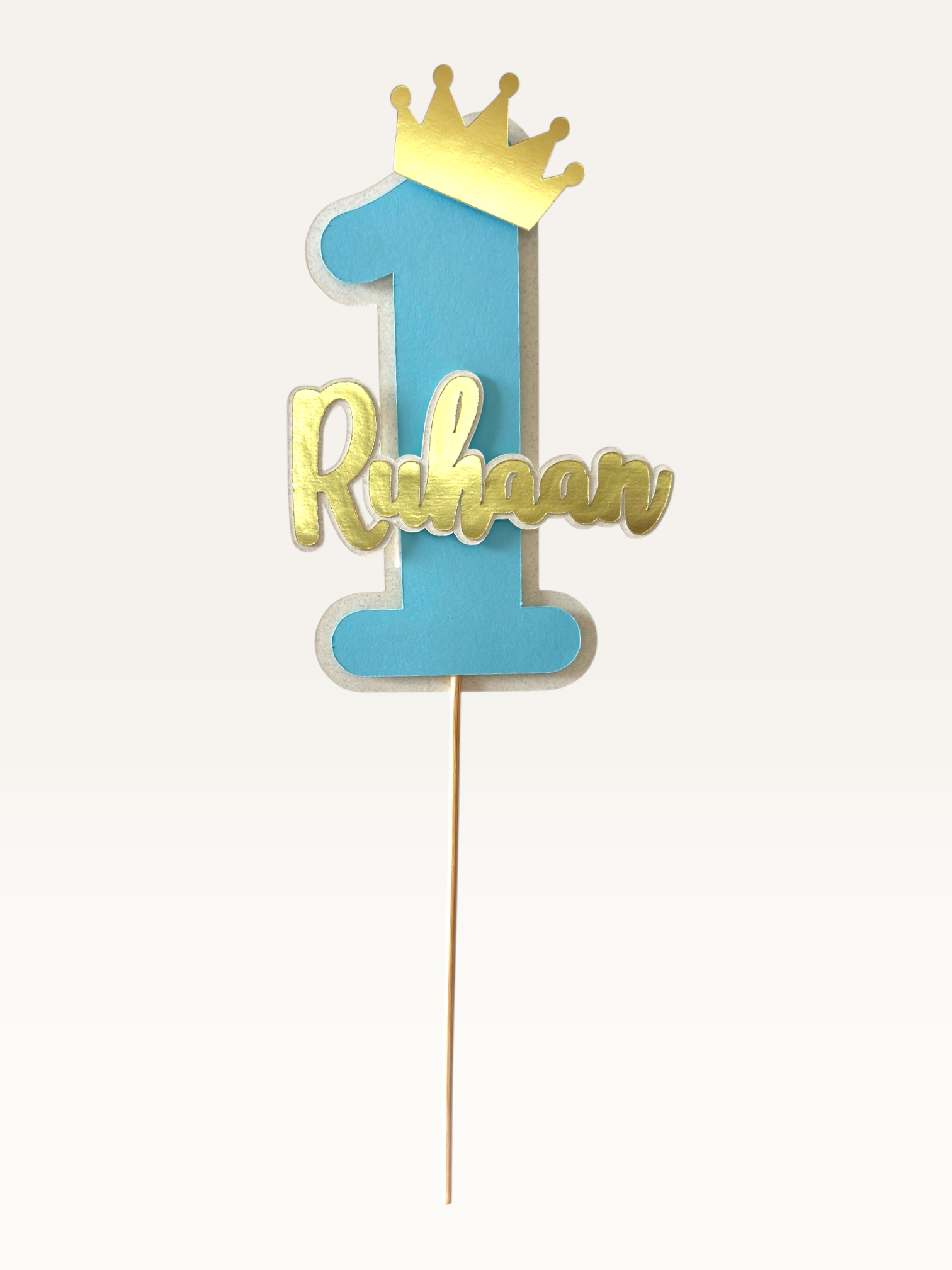 Paper Party Studio personalised first birthday cake topper with number one and crown