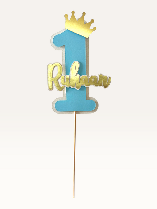 Paper Party Studio personalised first birthday cake topper with number one and crown