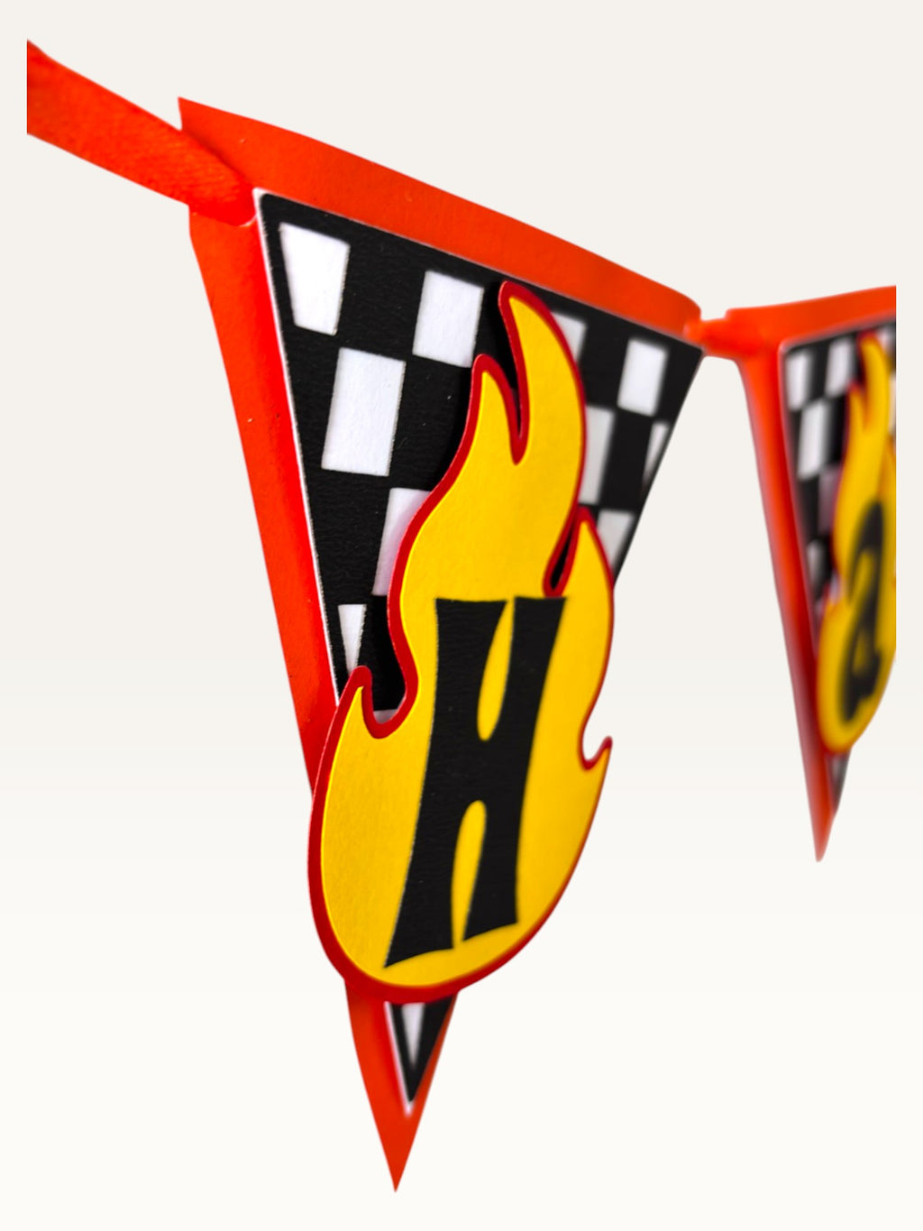 Paper Party Studio personalised racing birthday bunting with checkered flag and 3D yellow flame letter detail