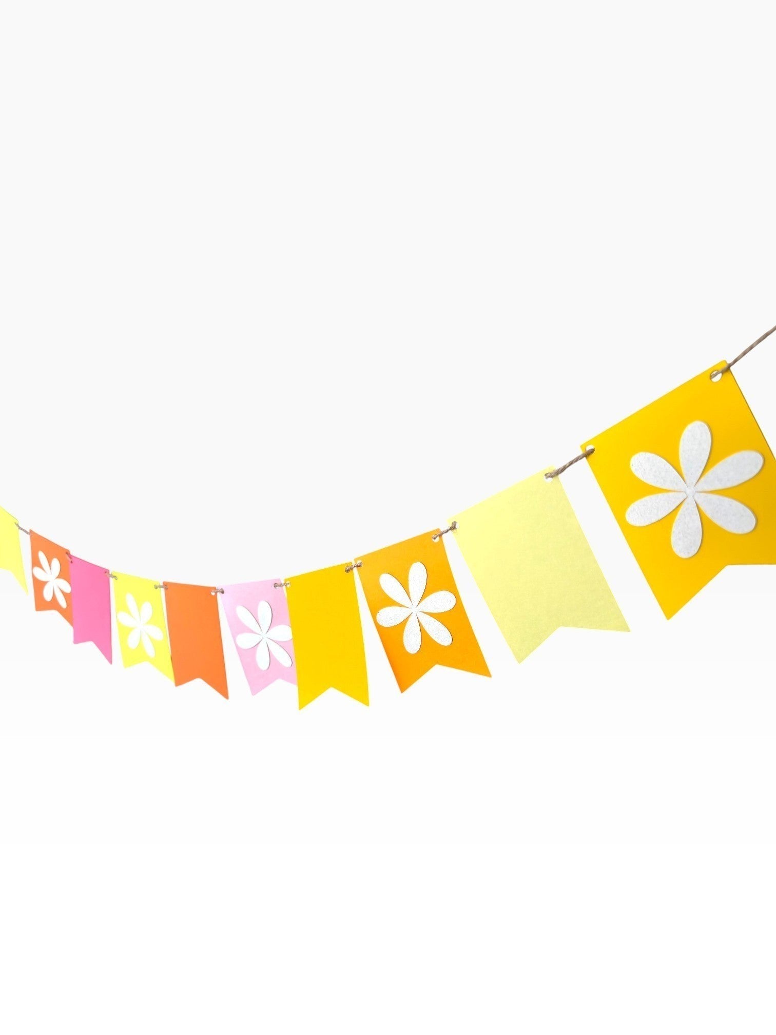 Paper Party Studio flower bunting with fishtail flags in yellow, pink, orange, and red, featuring white flower cut-outs.
