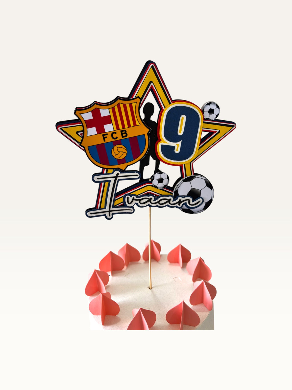 Paper Party Studio personalised football star cake topper with player silhouette, number 9, and soccer ball accents.