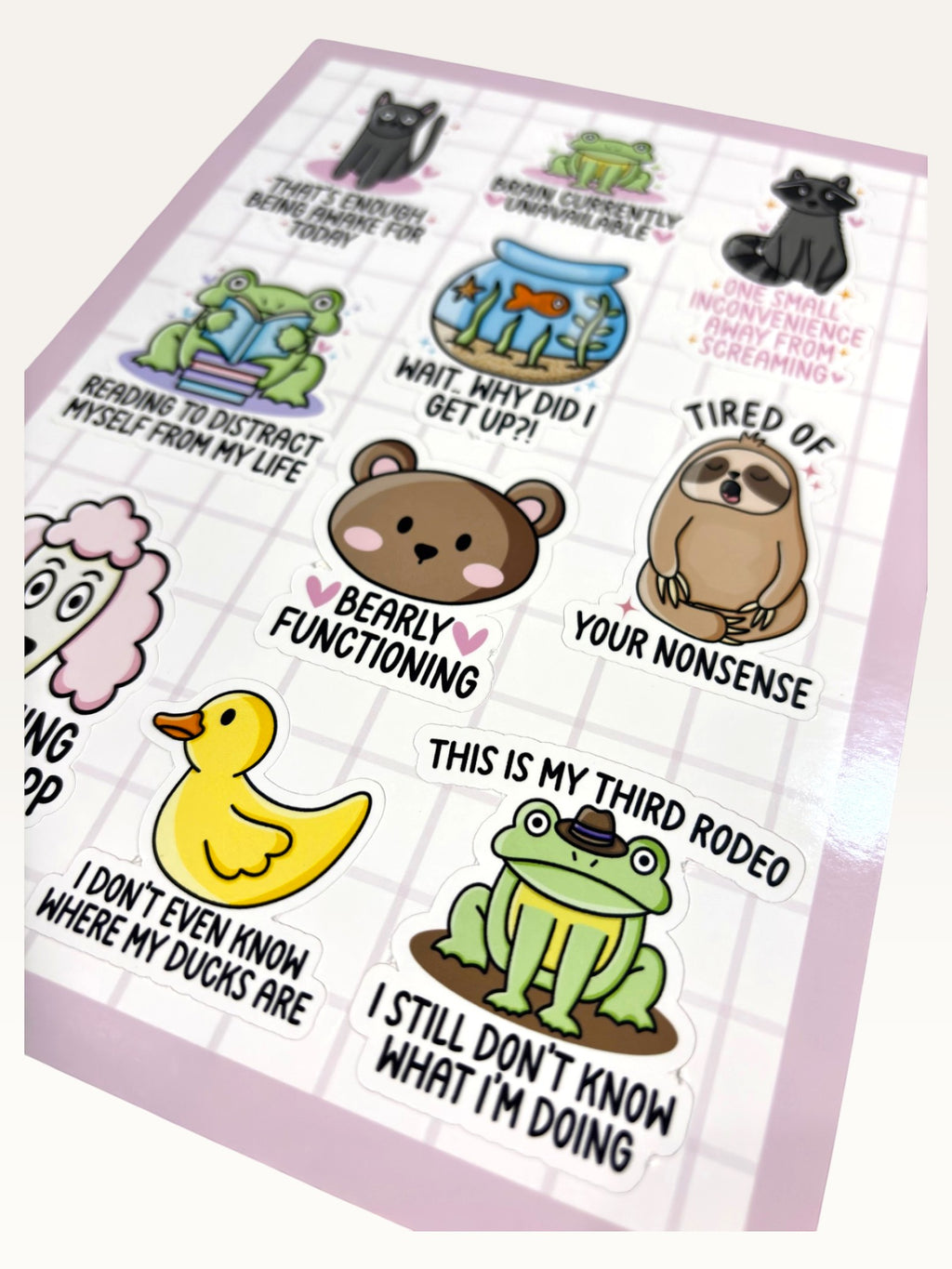 Paper Party Studio glossy sticker sheet featuring funny animals with relatable quotes like bearly functioning bear.