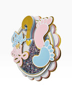Paper Party Studio "Boy or Girl?" gender reveal cake topper with pink and blue baby feet and glitter shaker.