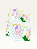 Paper Party Studio Gingham Garden birthday banner with pastel blue check flags, pink letters, balloons, and daisies.