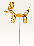 Paper Party Studio gold metallic balloon dog cupcake topper made of thick paper on a bamboo stick