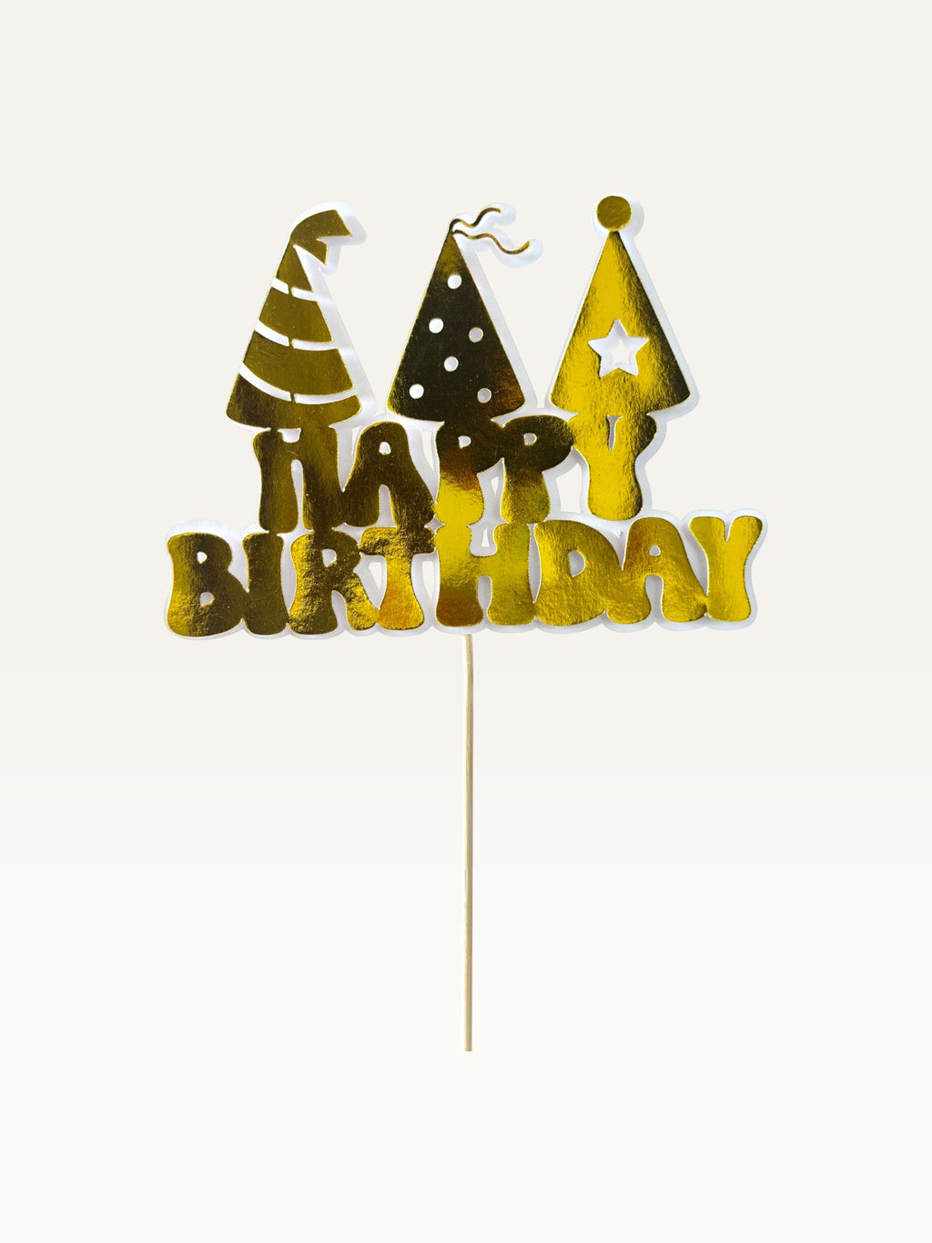 Paper Party Studio golden Happy Birthday cake topper with three party hat cut-outs on a slim wooden pick.