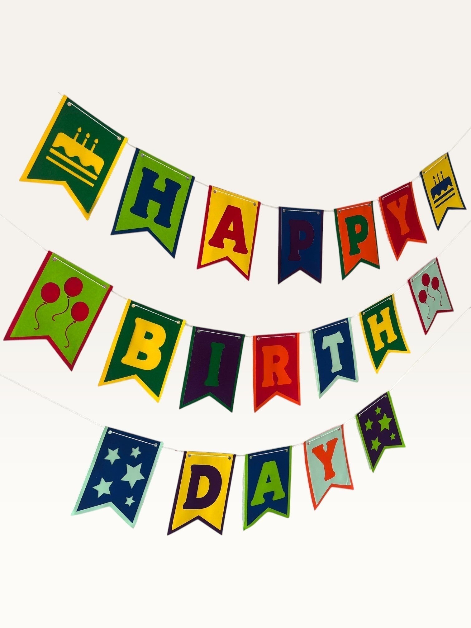 Paper Party Studio multicolour swallowtail Happy Birthday banner with cake, balloon, and star decorative tiles.