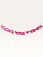 Paper Party Studio handmade I Love You paper banner in pink with heart and love-letter accents for romantic events.
