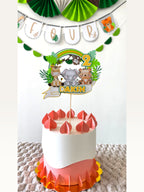 Paper Party Studio jungle safari birthday cake topper with giraffe, elephant, and tiger, featuring name and age.