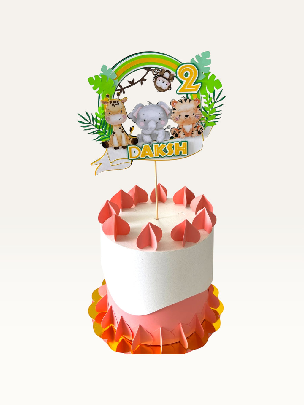 Paper Party Studio personalised jungle safari cake topper with giraffe, elephant, tiger, and monkey on a birthday cake.