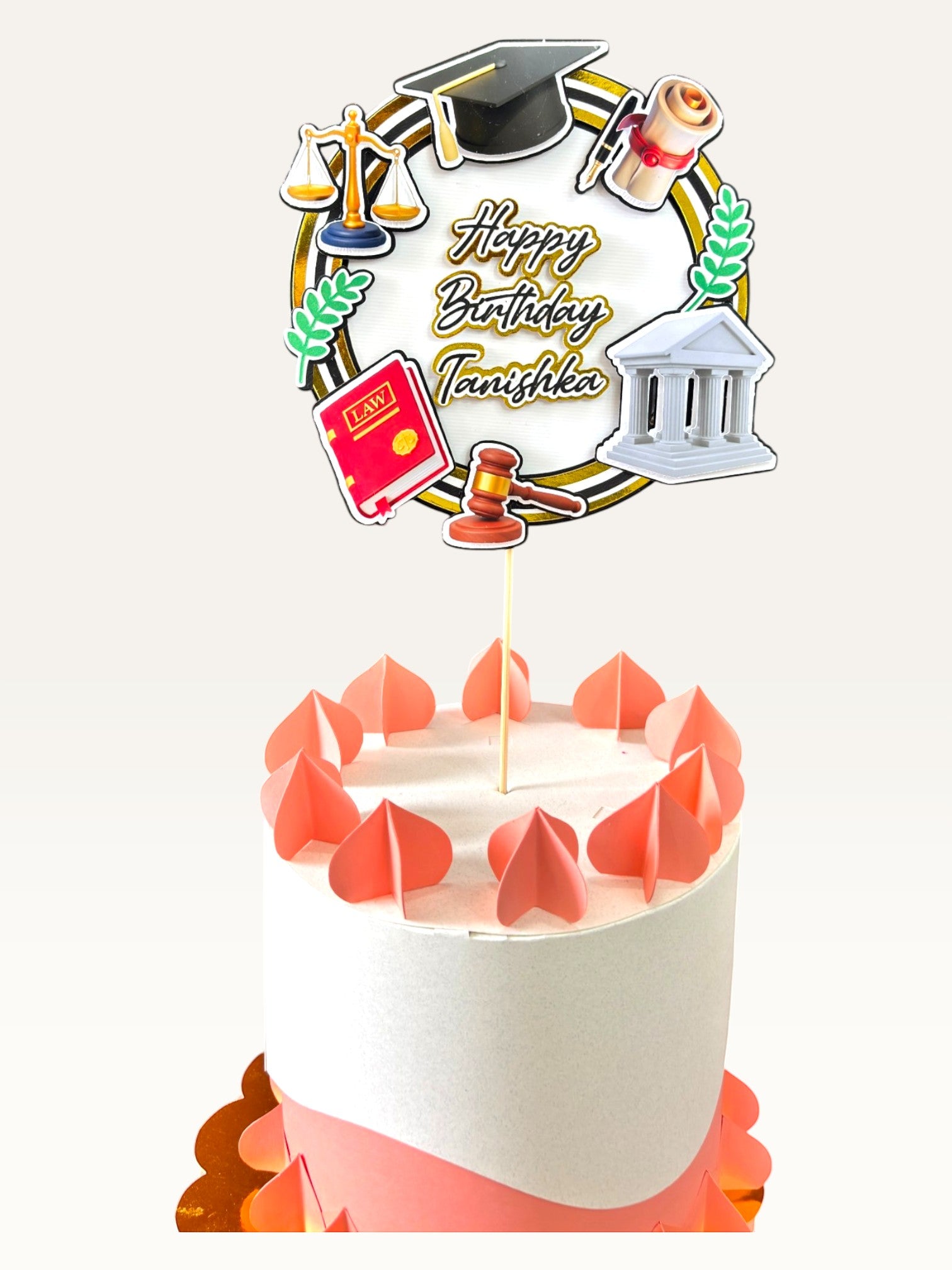 Paper Party Studio personalised 3D law-themed cake topper with scales, gavel, and diploma on a white cake