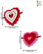 Paper Party Studio layered heart garland with red, pink, and white scalloped cardstock hearts and stitched details.