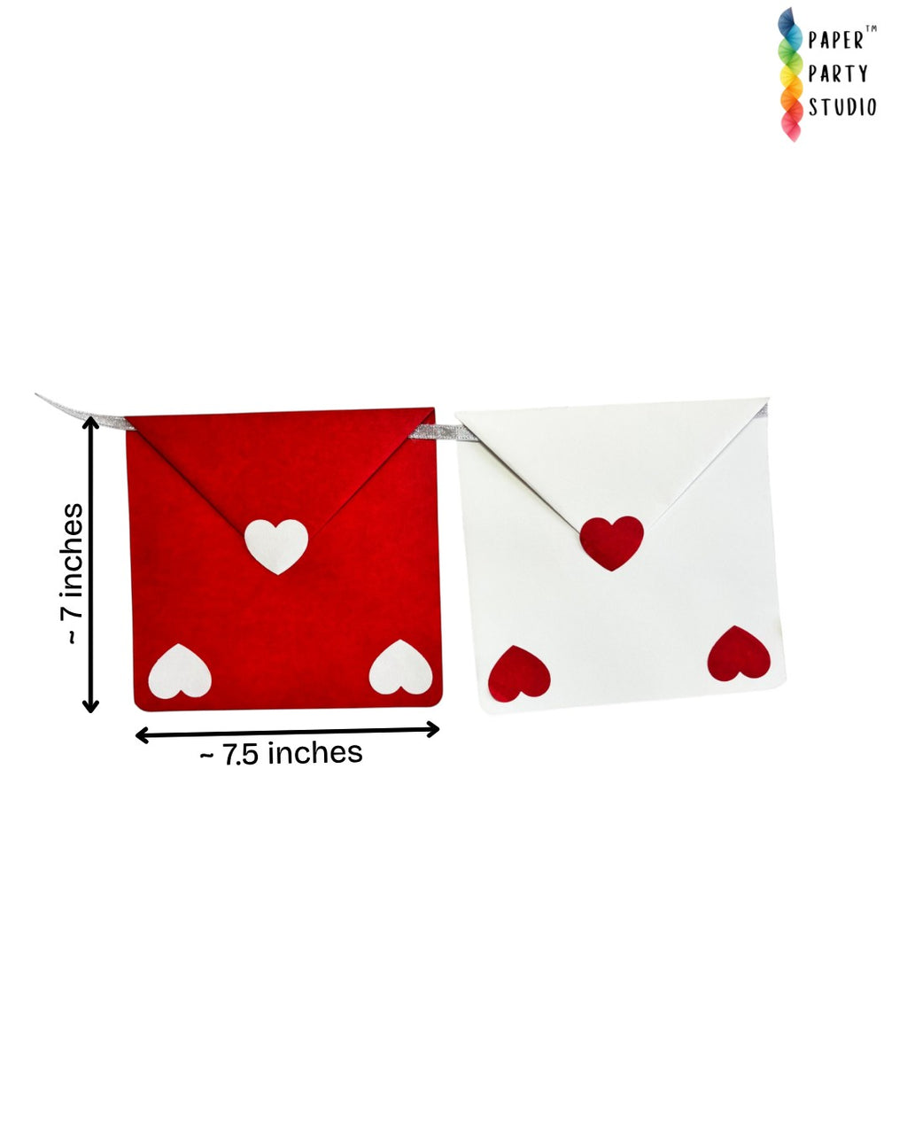 Paper Party Studio red and white envelope bunting with heart cut-outs on a silver cord for Valentine's Day decor.