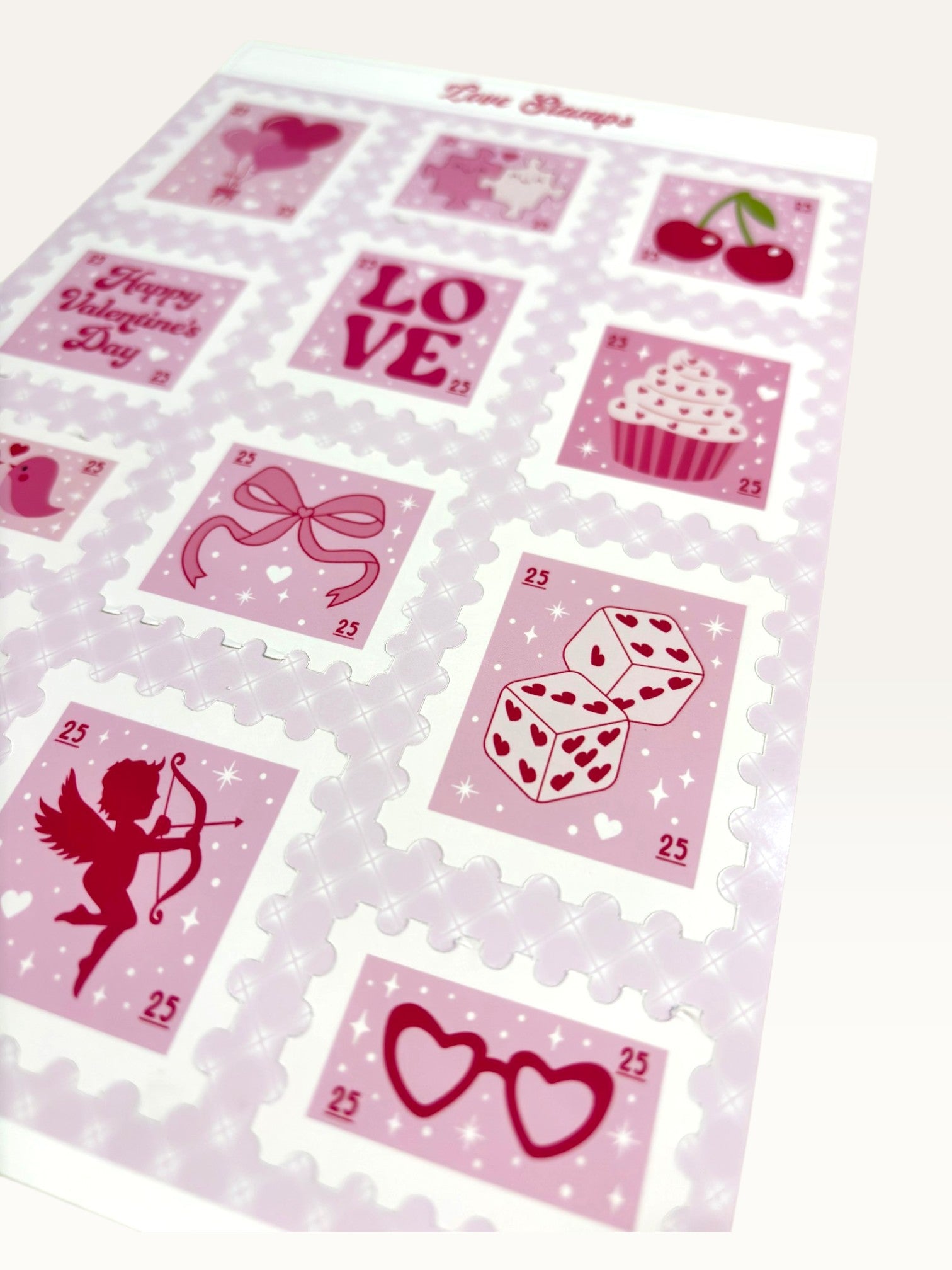 Paper Party Studio Love Stamps sticker sheet featuring vintage-style pink postage stamps with romantic illustrations.