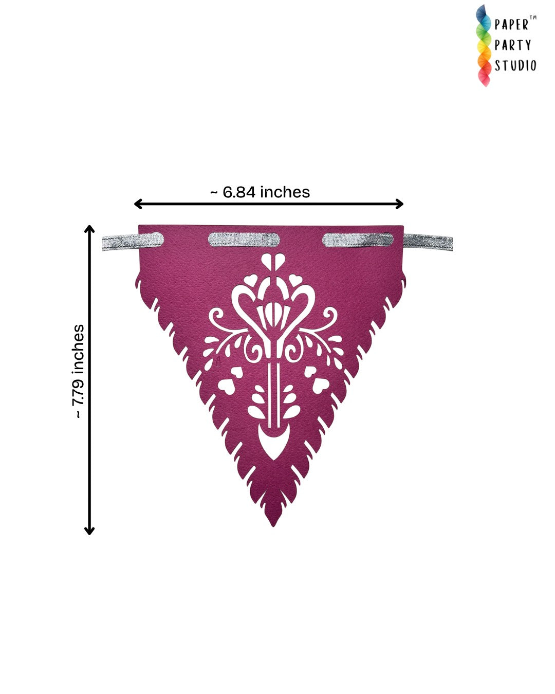 Paper Party Studio magenta papel picado bunting with intricate floral cut-outs on a silver ribbon for wedding decor.