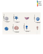Paper Party Studio under the sea hanging backdrop with pink and blue cardstock mermaid, shell, and starfish shapes.