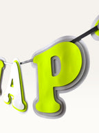 Paper Party Studio layered neon and grey Happy Birthday banner with bold cut-out letters on a string.